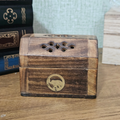 Wooden treasure chest incense cone holder with carved lid and brass-effect detail
