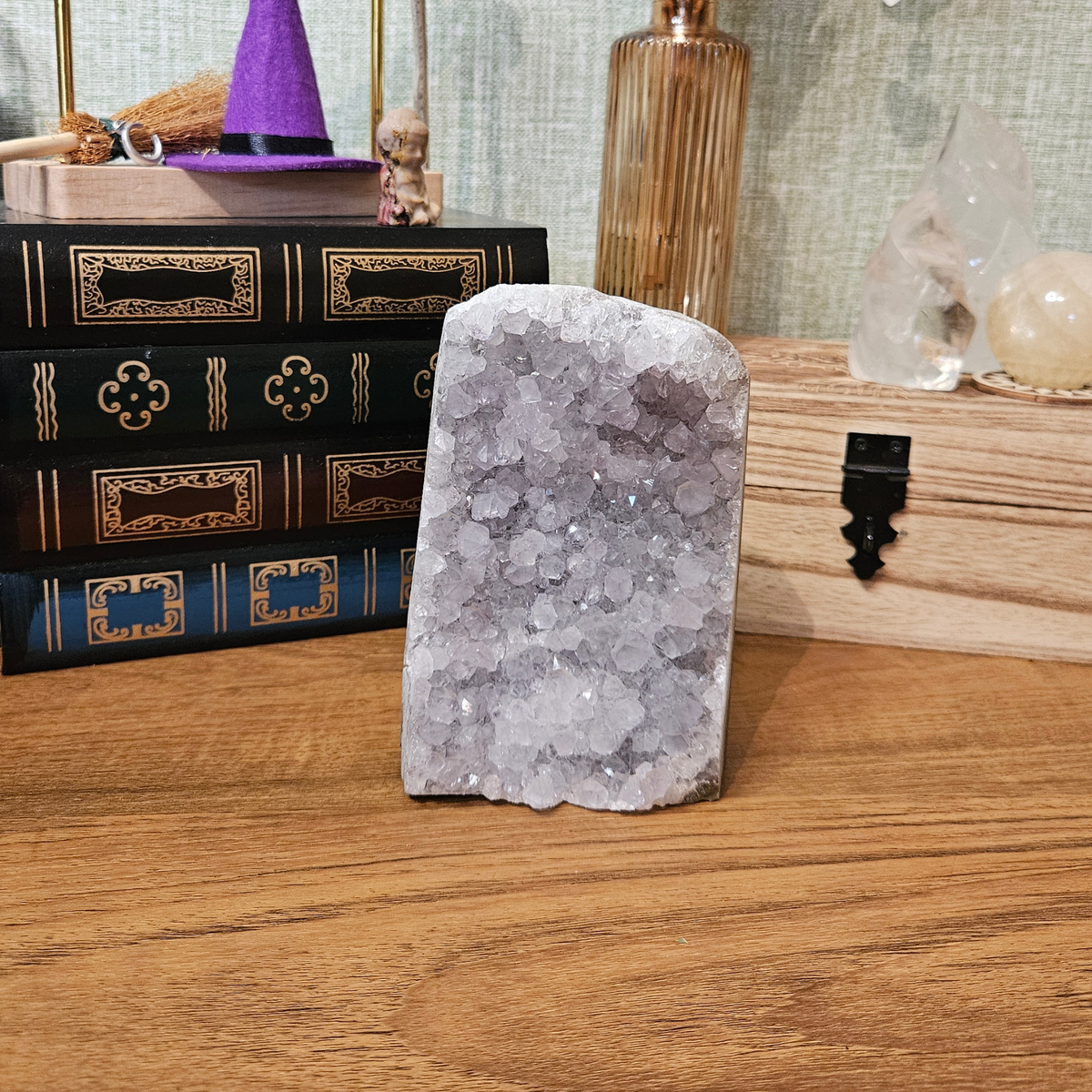 Large natural Brazilian amethyst crystal cluster with freestanding cut base, weighing 998g