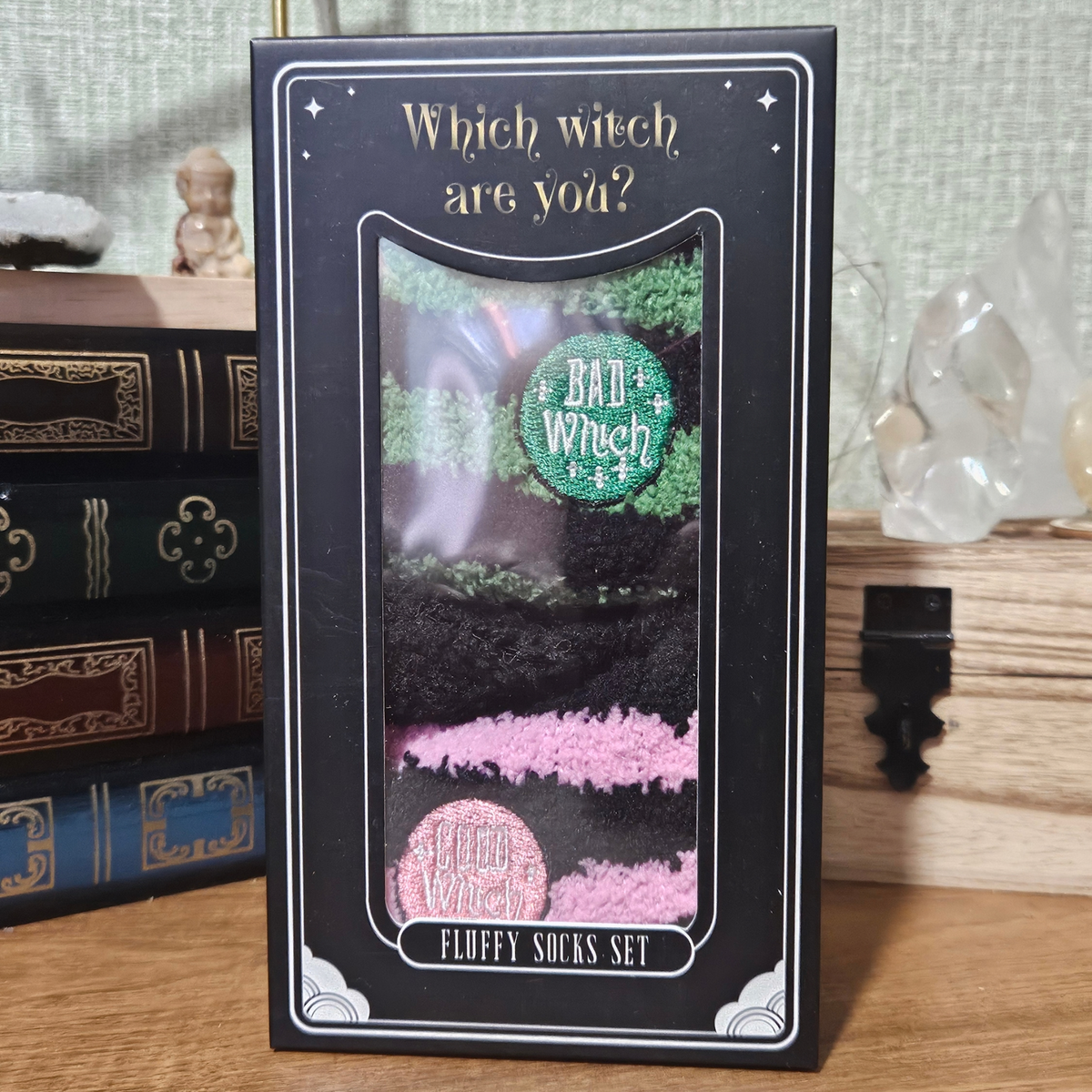 Boxed set of Good Witch pink and black and Bad Witch green and black fluffy striped socks.