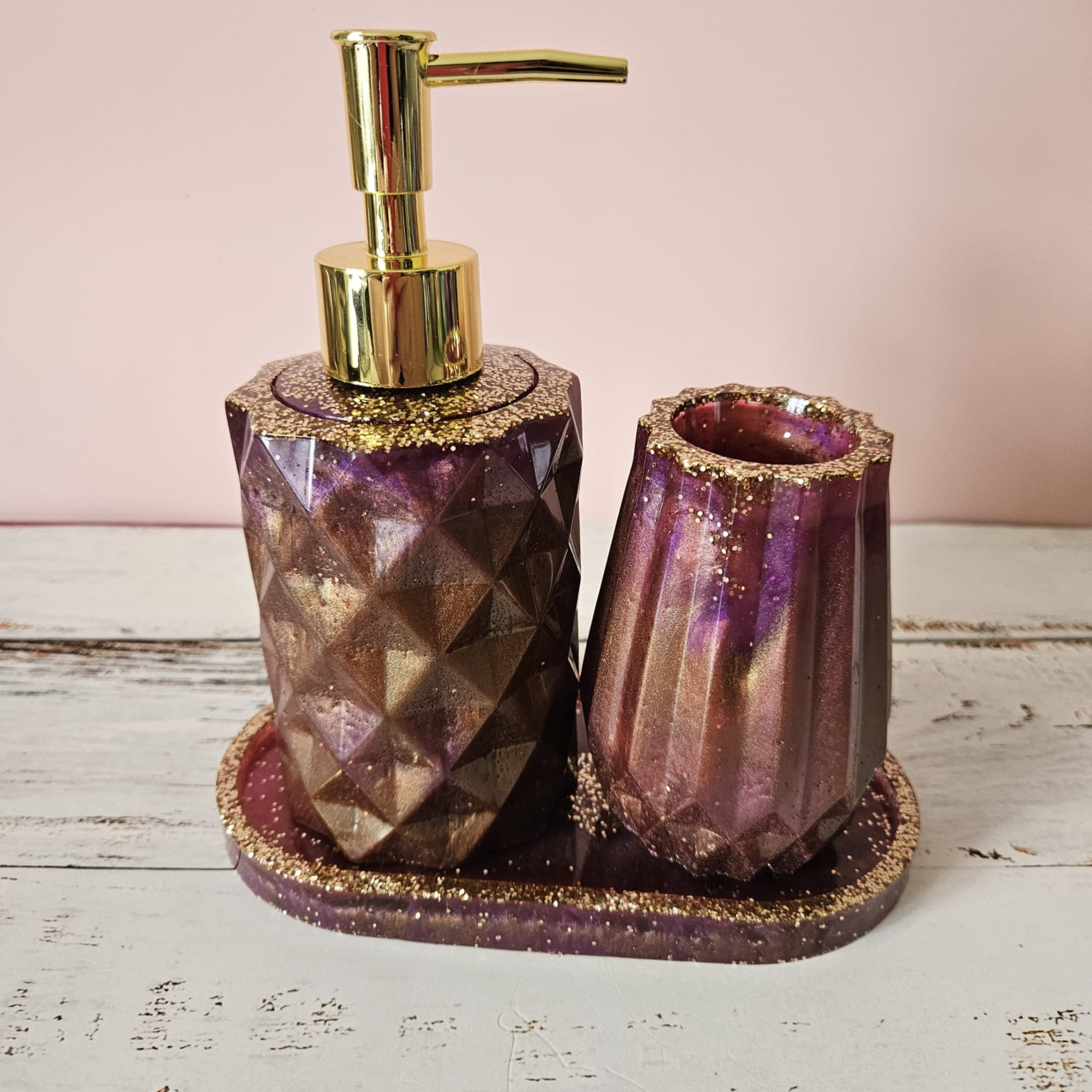 Purple and antique gold handmade resin soap dispenser and tumbler on matching glitter tray