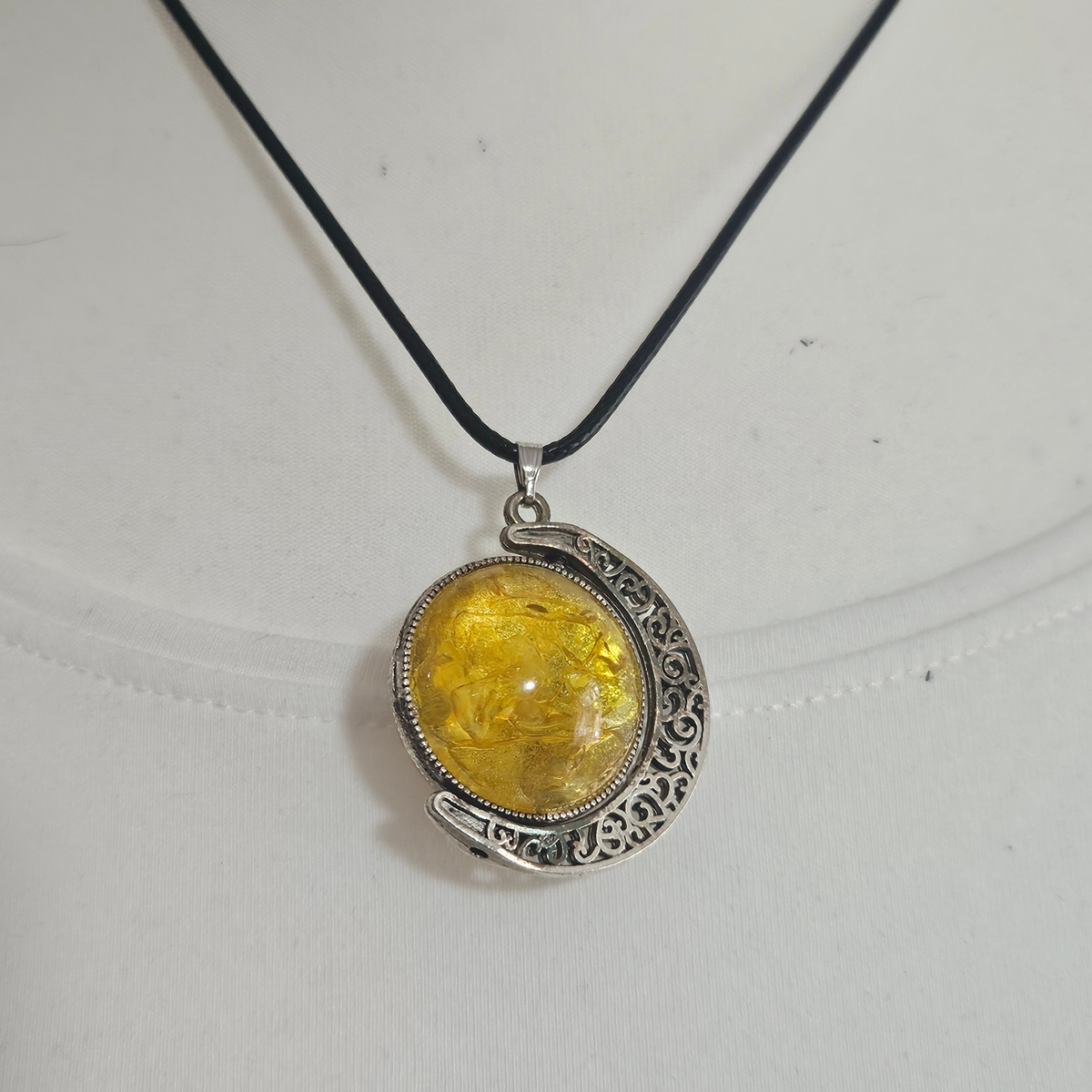 Handmade Citrine crystal chip pendant necklaces set in resin within decorative metal bezels in a choice of designs.