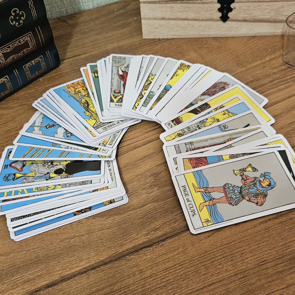 The Classic Tarot 78-card deck with traditional illustrated tarot cards, cream celestial box and guidebook.