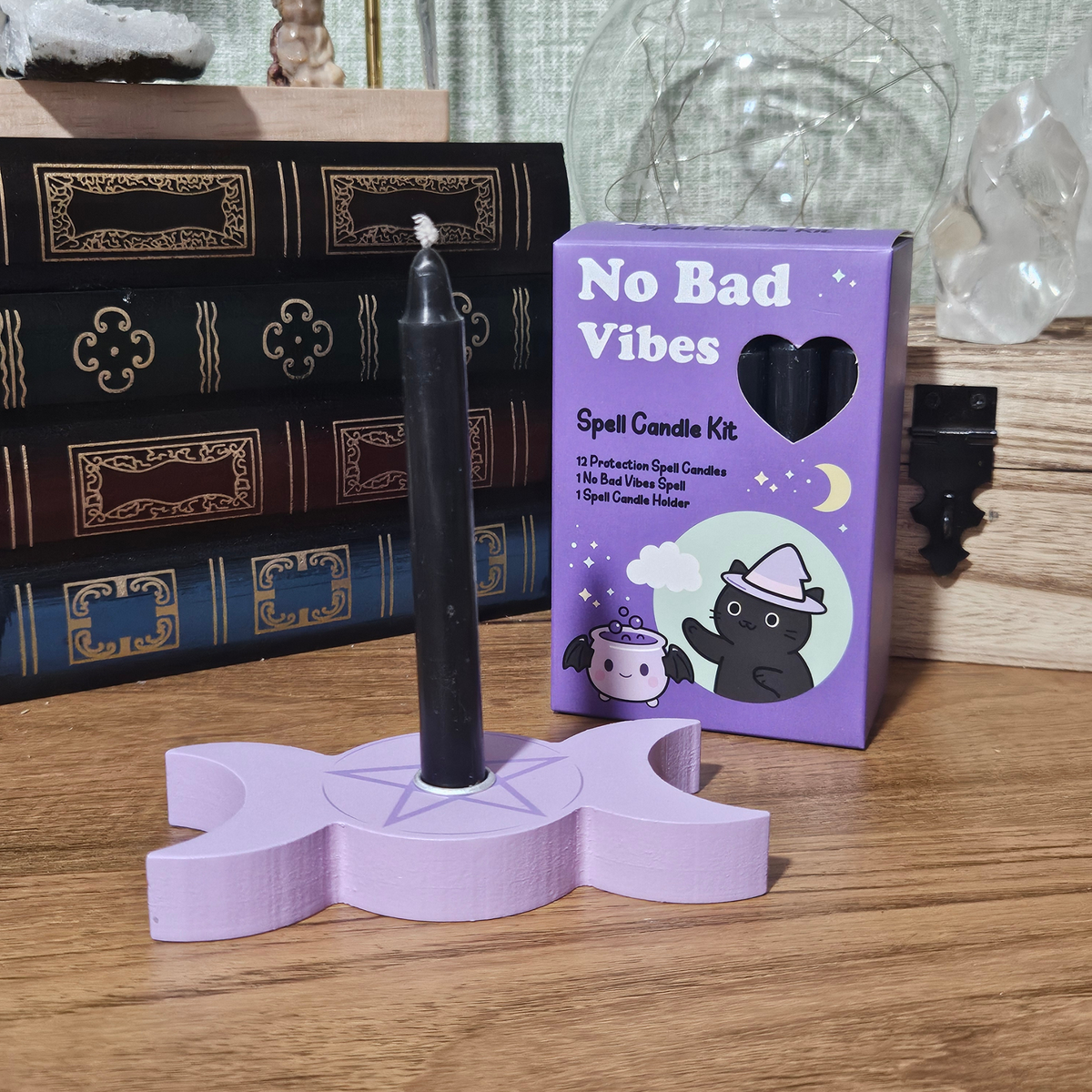 No Bad Vibes Spell Candle Kit with black protection candle and triple moon candle holder.