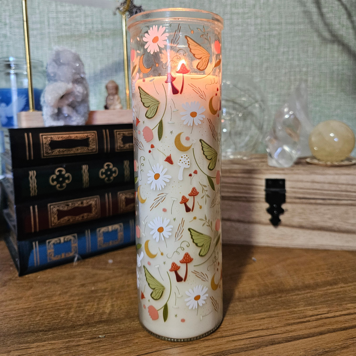 Moss and Sandalwood scented pillar candle in glass decorated with mushrooms, moths, crescent moons, daisies and woodland illustrations.