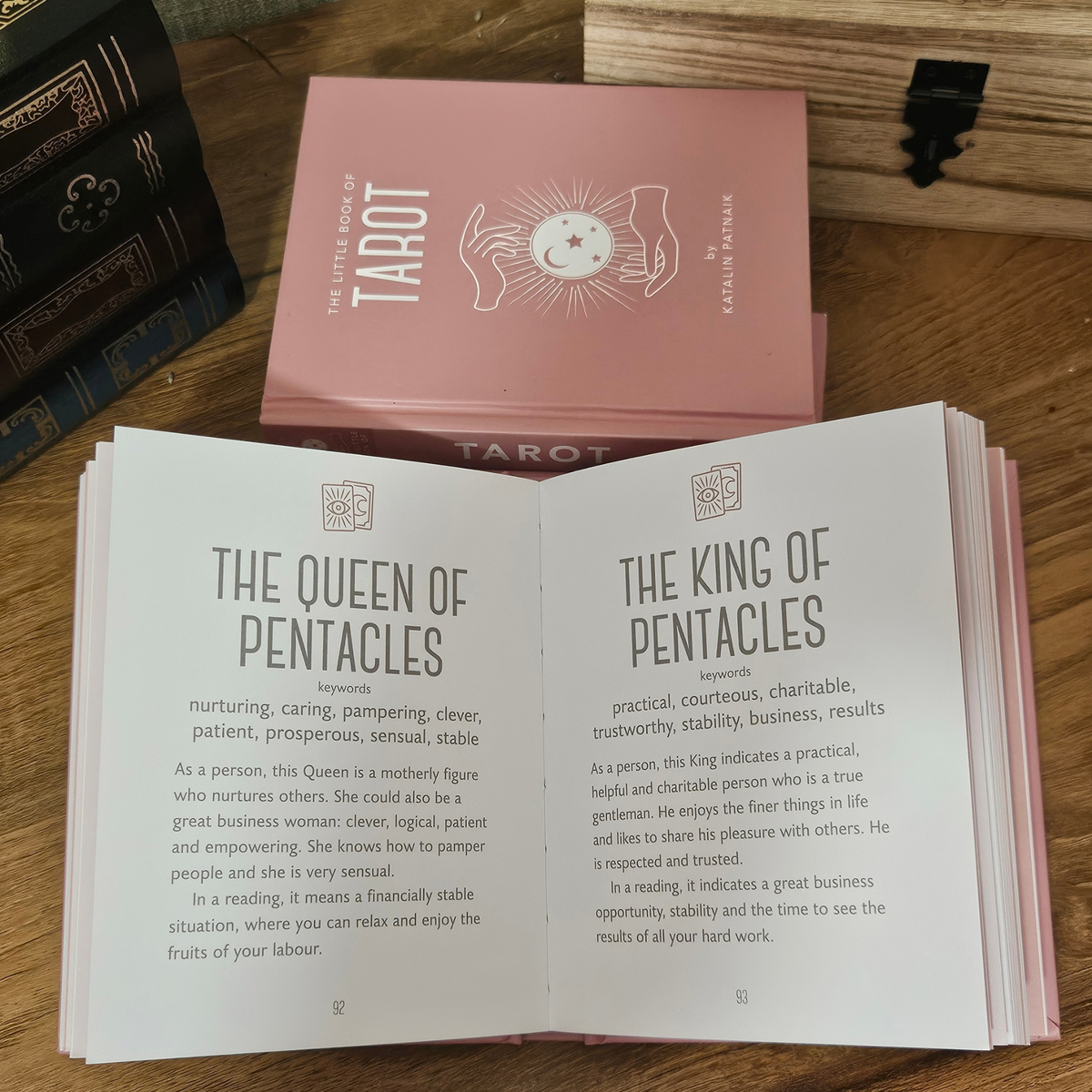Pink hardback copy of The Little Book of Tarot by Katalin Patnaik.