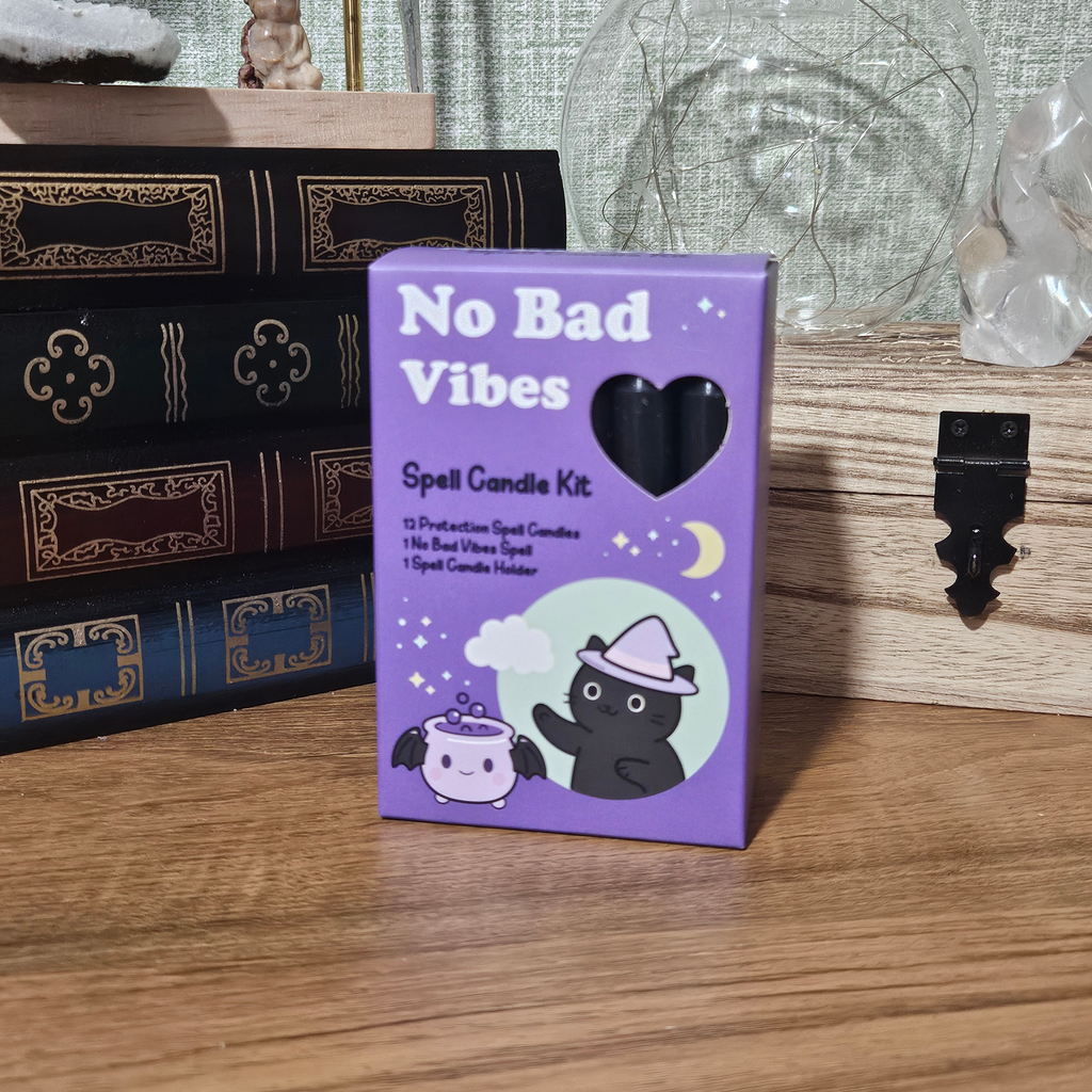 No Bad Vibes Spell Candle Kit with black protection candle and triple moon candle holder.