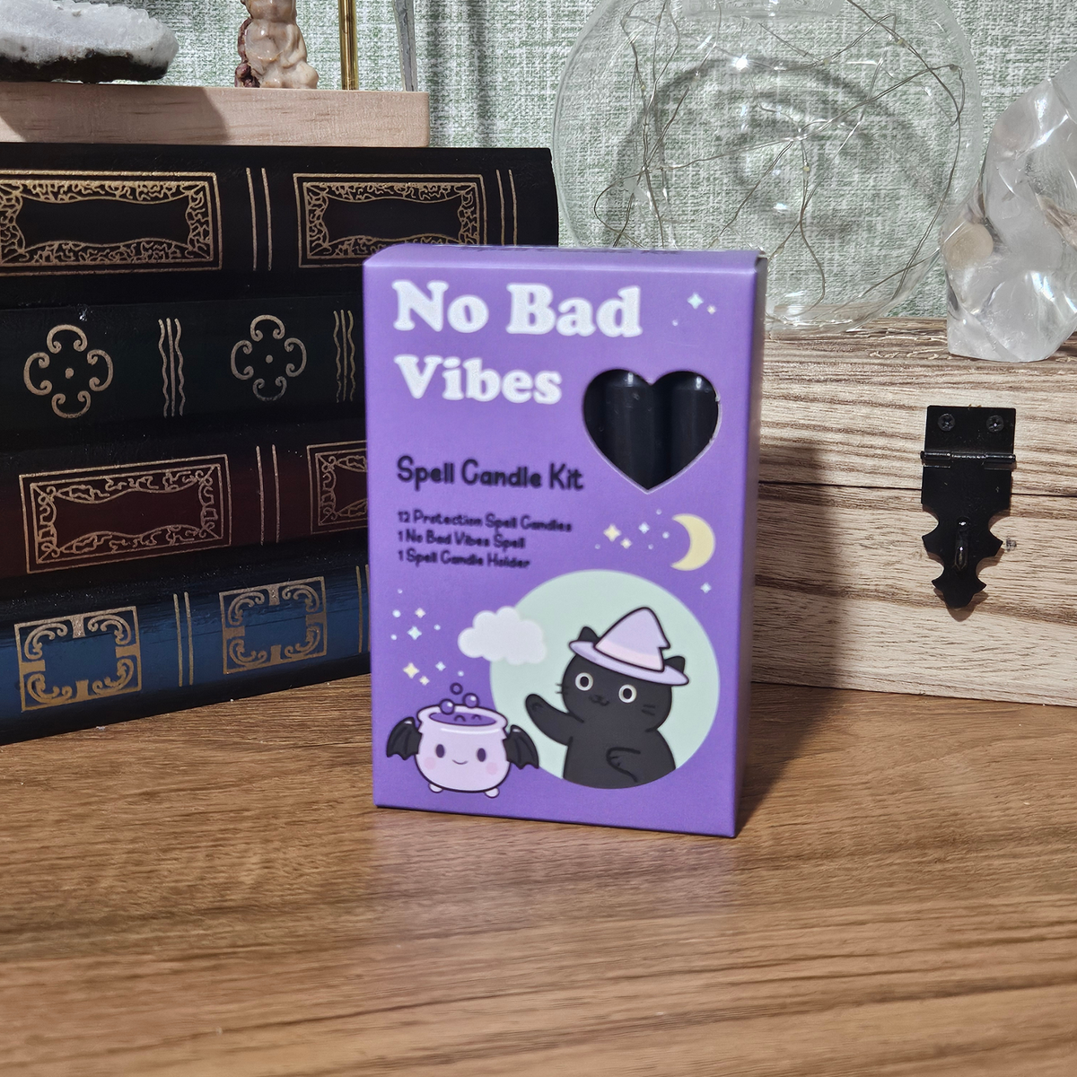 No Bad Vibes Spell Candle Kit with black protection candle and triple moon candle holder.