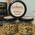 Georgie's Apothecary dried chamomile flowers in a 15g reusable glass apothecary jar