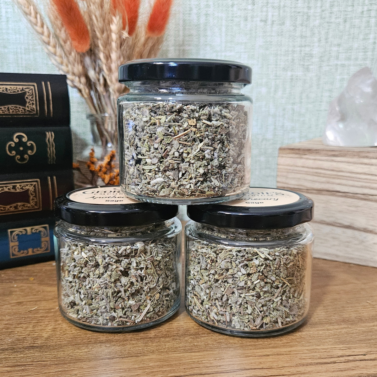 Reusable glass apothecary jars filled with dried sage