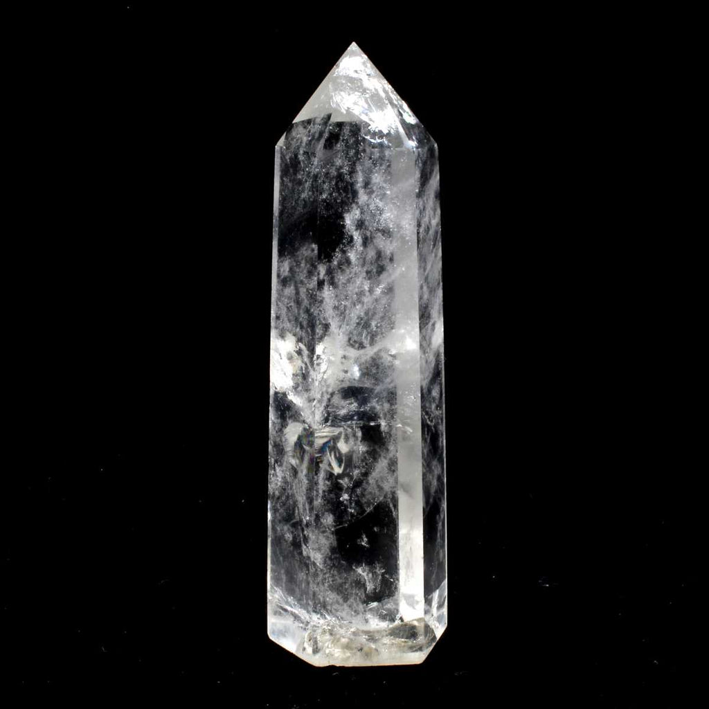 Polished clear quartz crystal point showing natural internal formations and transparent to cloudy quartz